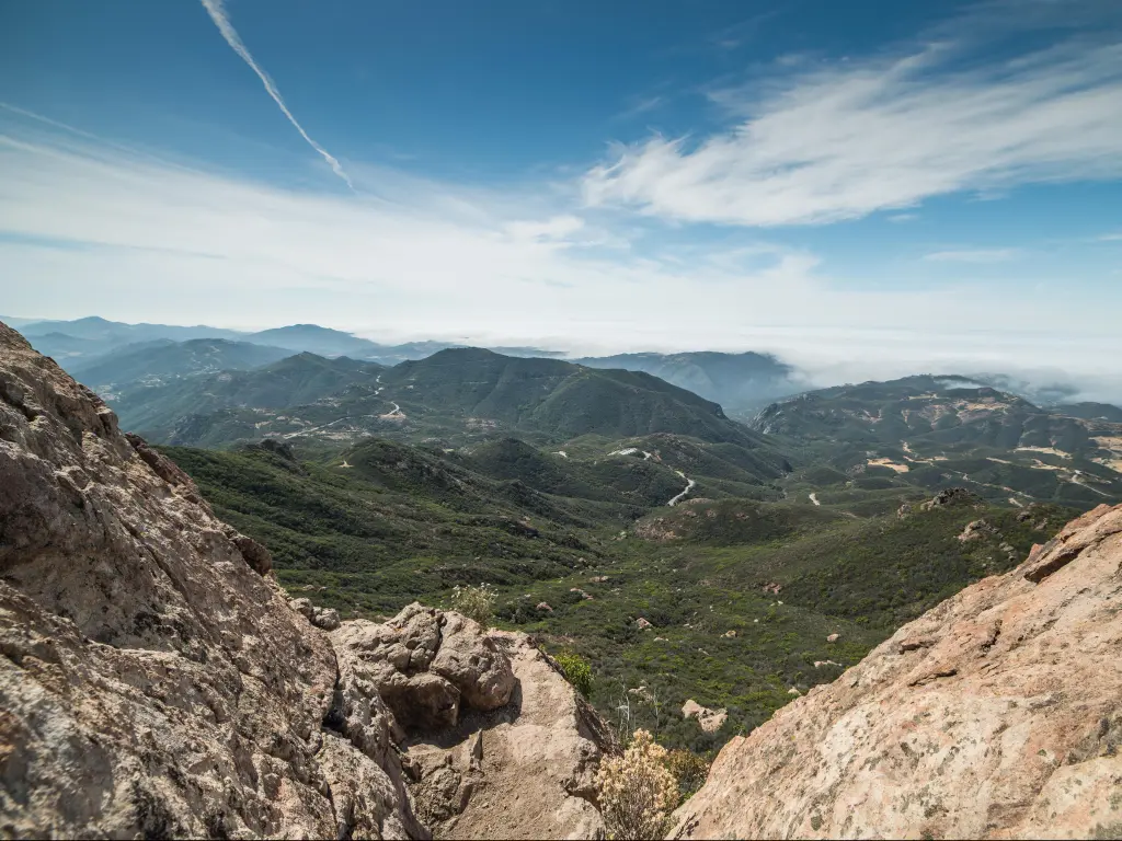 Santa Monica Mountains National Recreation Area, California, USA with a view of Foggy Malibu and the Pacific Ocean from the Summit of Sand Stone Peak.