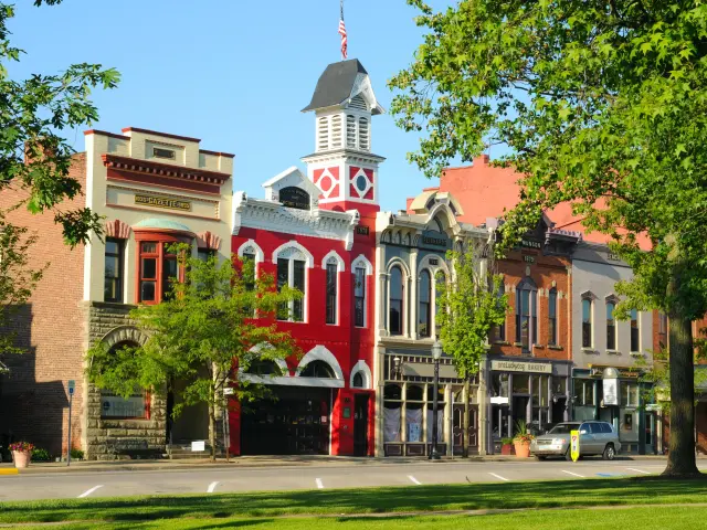 Historic town hall and firehouse on a main street seen on a sunny day