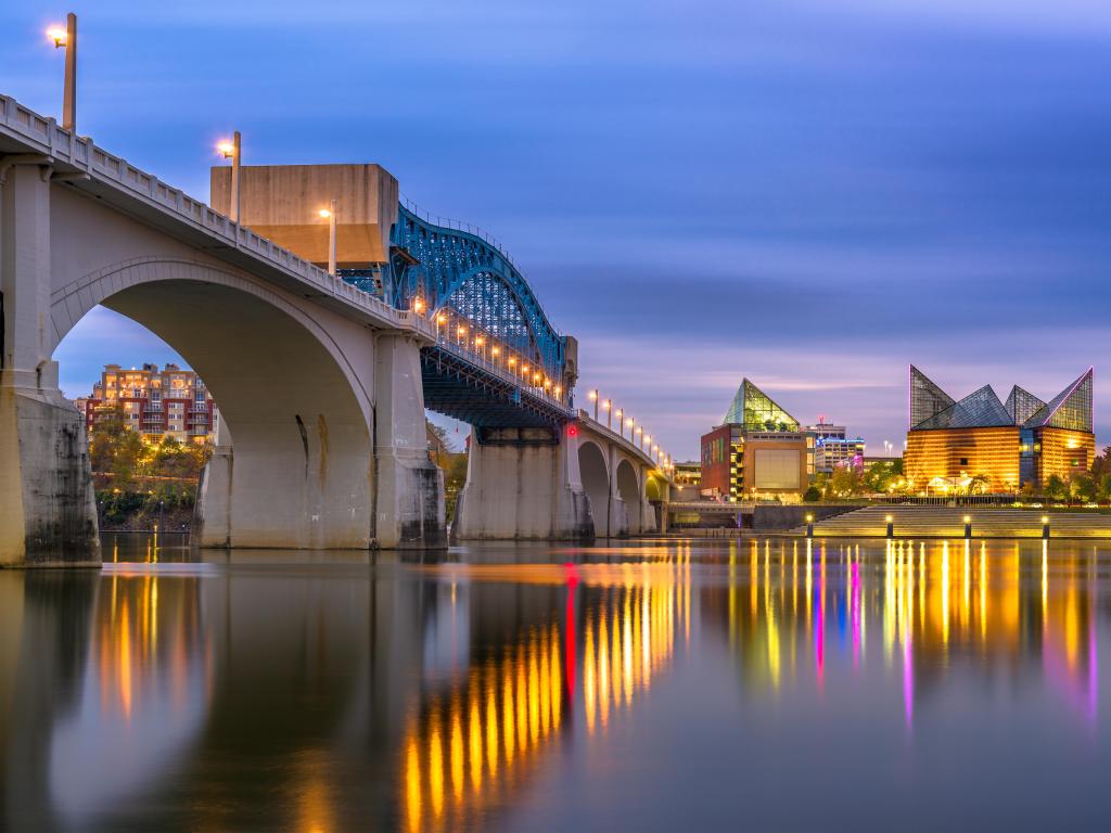 Chattanooga, Tennessee, USA downtown skyline on the Tennessee River at dusk.