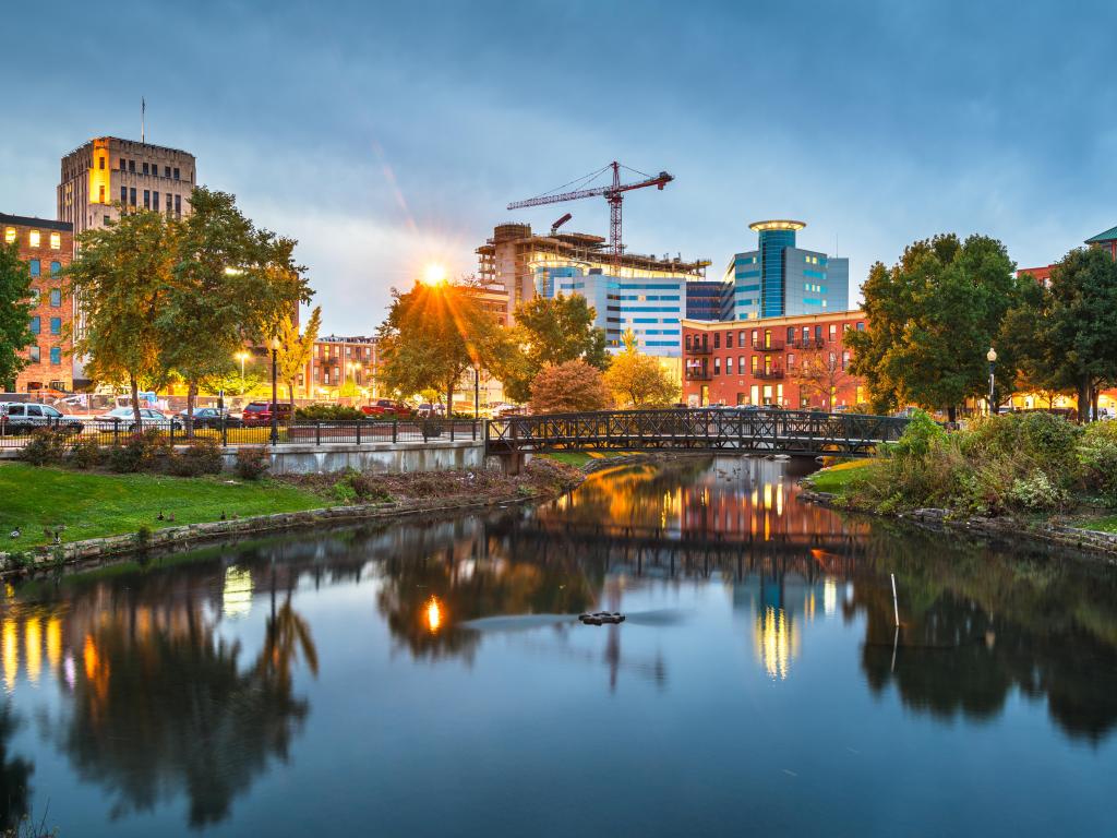 Kalamazoo, Michigan, USA downtown cityscape and park at dusk.