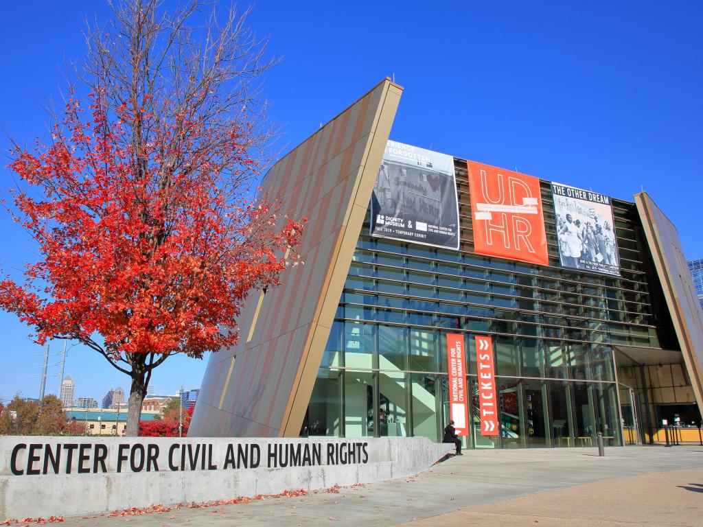 The facade of the museum on a sunny day with blue skies