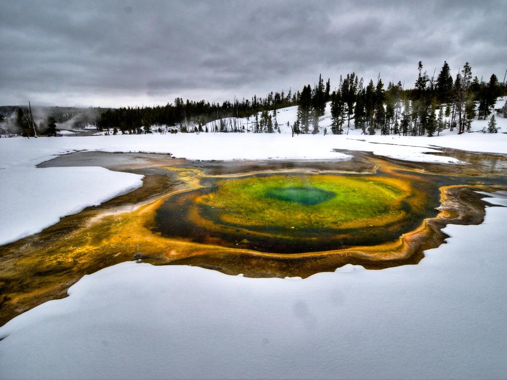 Yellowstone National Park, USA with the colorful hot mineral springs in Yellowstone during wintertime.