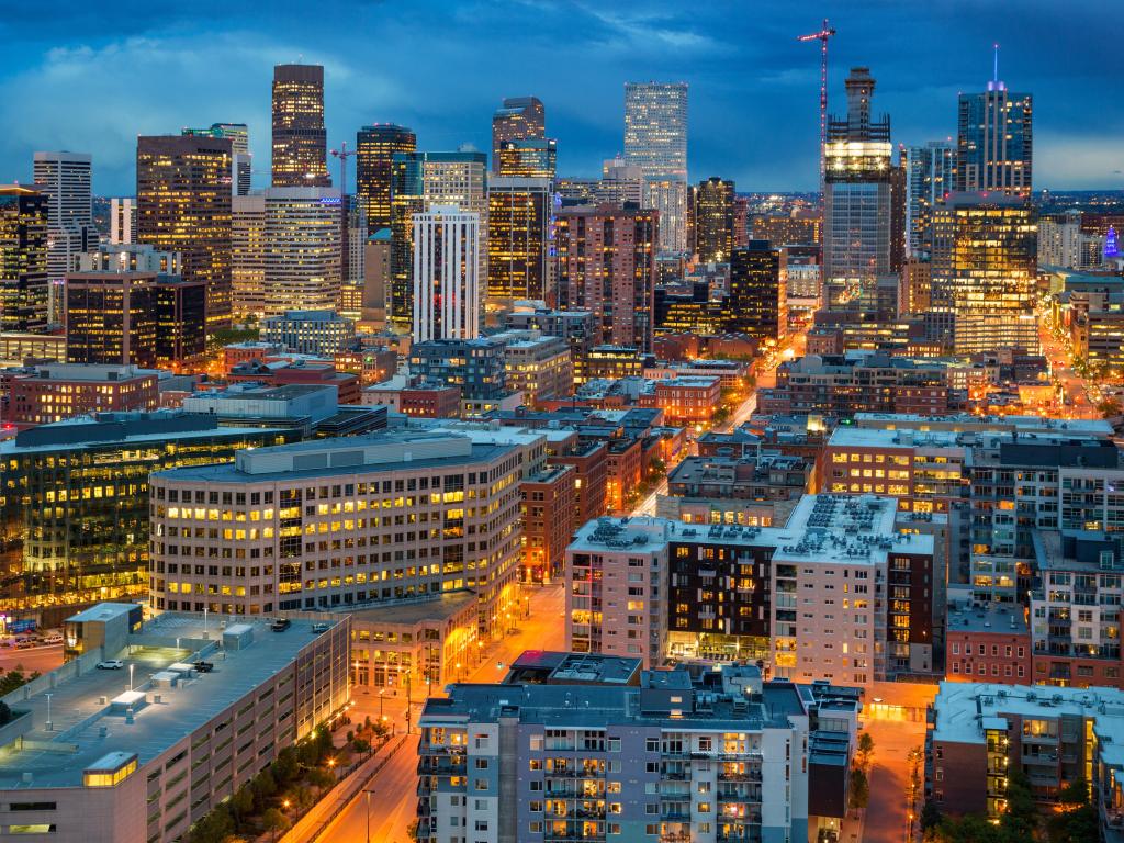 View of Denver Skyline at sunset as the skies get dark.