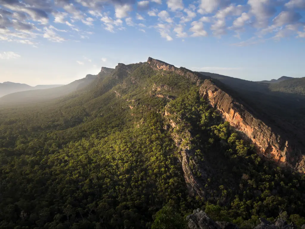 Grampians National Park, Victoria, Australia with a landscape photograph of the Wonderland Range and the Pinnacle lookout in the Grampians National Park, Victoria in the early morning on a clear sunny day, looking from Chatauqua Peak near Halls Gap