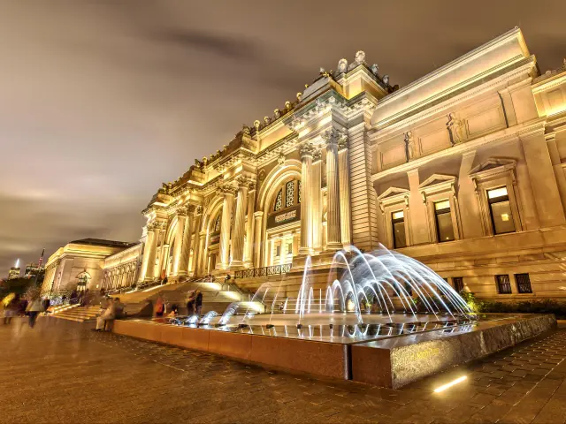 Entrance of The Metropolitan Museum of Art illuminated during night time