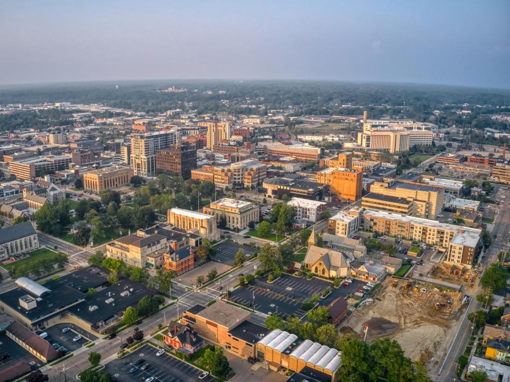 Aerial view of Kalamazoo, Michigan in summertime, with historic buildings visible in the twilight