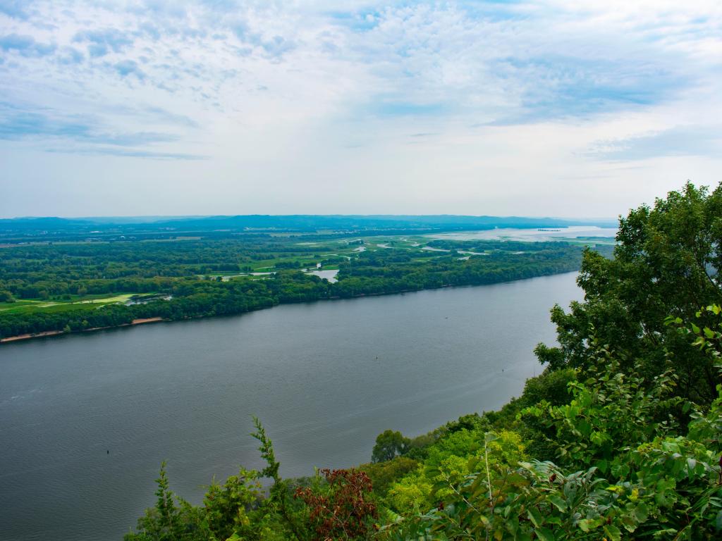 Mississippi River view from in between the trees on a cloudy day