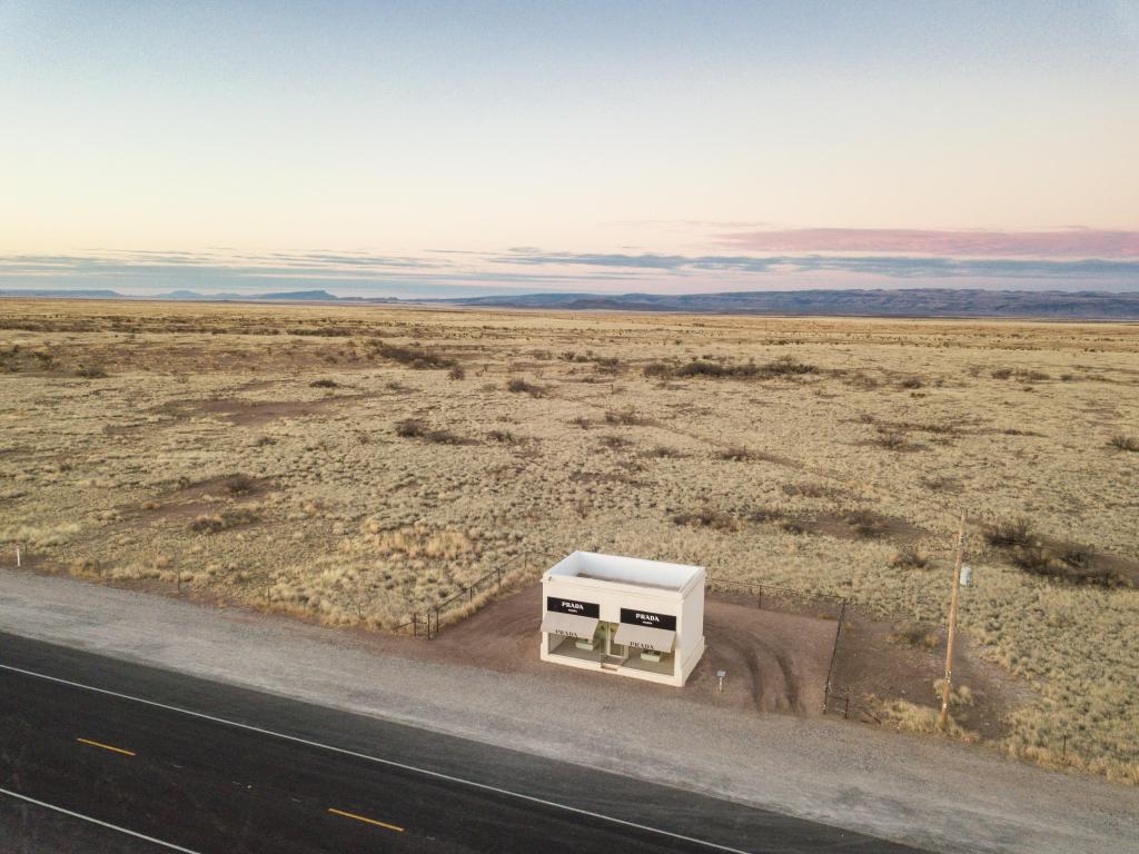 The Prada Marfa store sits alone at dawn in the middle of the desert