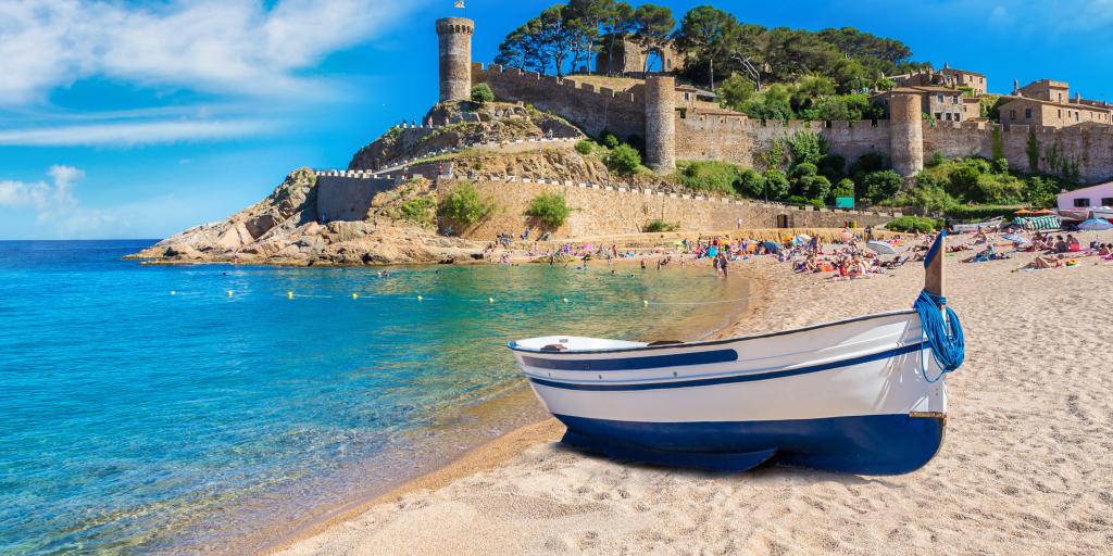 Beach at Tossa de Mar and fortress in a beautiful summer day - Costa Brava, Catalonia