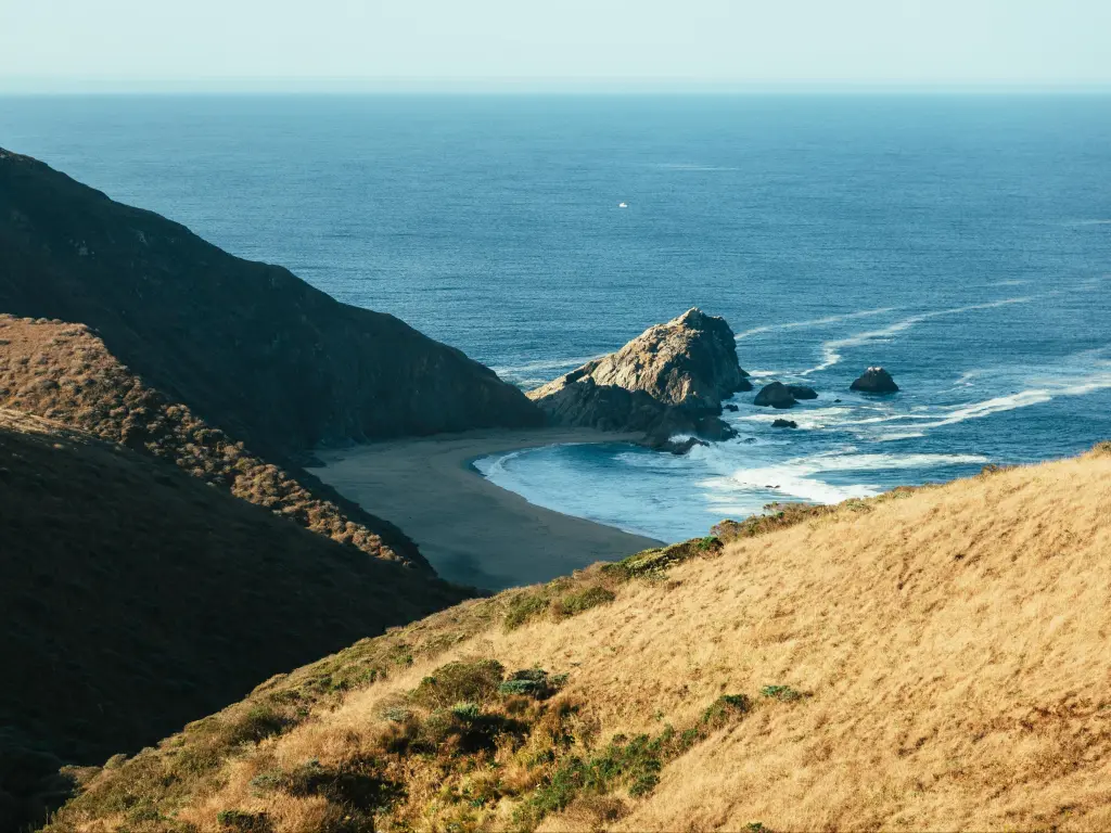 View over McClures Beach from Tomales Point, with rocky coastline and crashing waves below