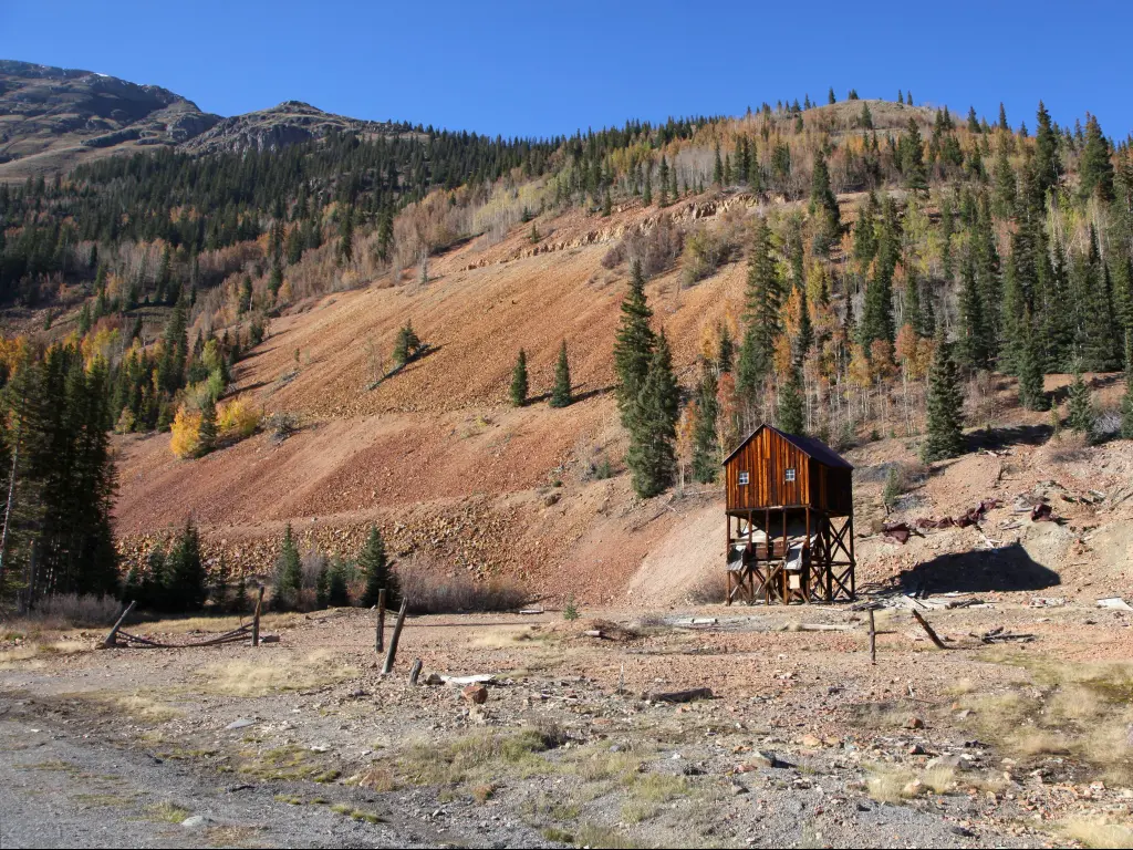 An abandoned and deserted wooden mine shaft beside the Million Dollar Highway, Colorado