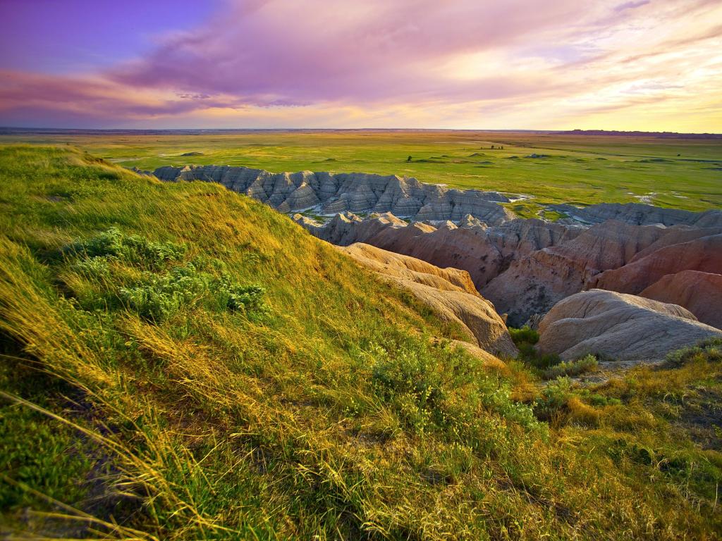 Dakota Prairie Grasslands, South Dakota, USA with Prairies and Badlands taken at sunset.