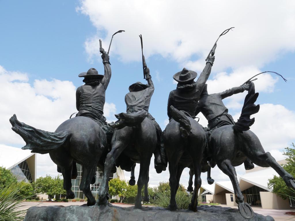 Back view of the Statue of Coming Through the Rye designed by Frederick Remington at National Cowboy & Western Heritage Museum in Oklahoma City.