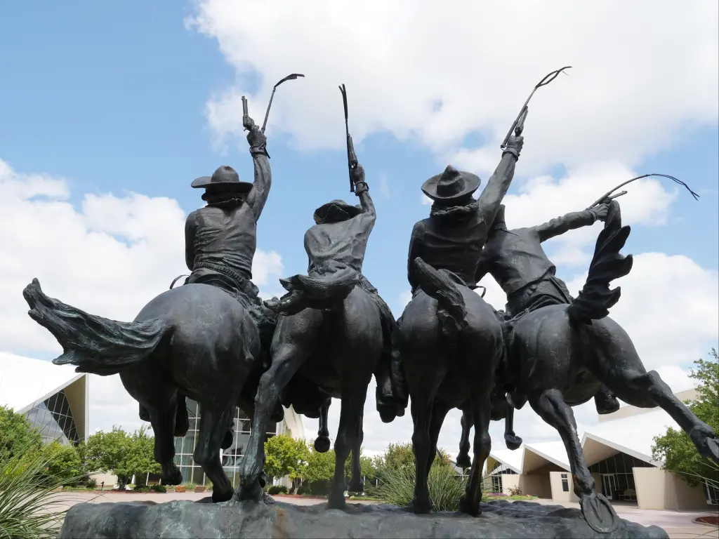 Back view of the Statue of Coming Through the Rye designed by Frederick Remington at National Cowboy & Western Heritage Museum in Oklahoma City.