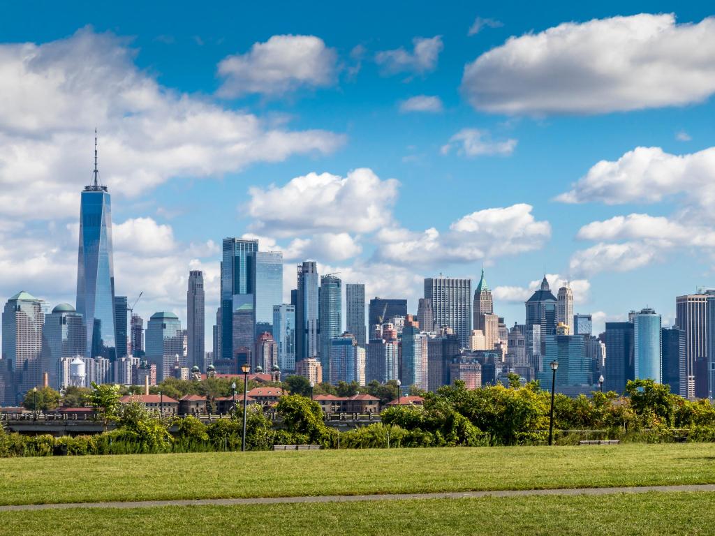 Liberty State Park, New York City, USA taken during fall, with a view from the park to the skyline of Manhattan on a sunny day.