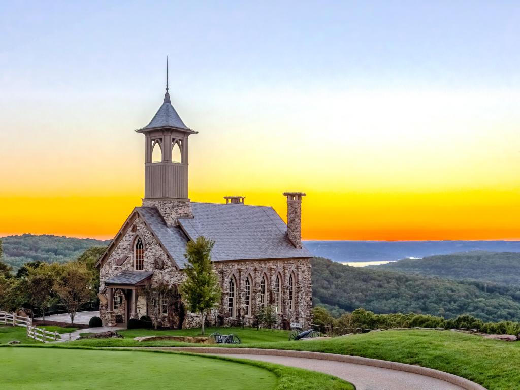 Church in the mountains during sunset at the Top of the Rock at Branson, Missouri, USA.