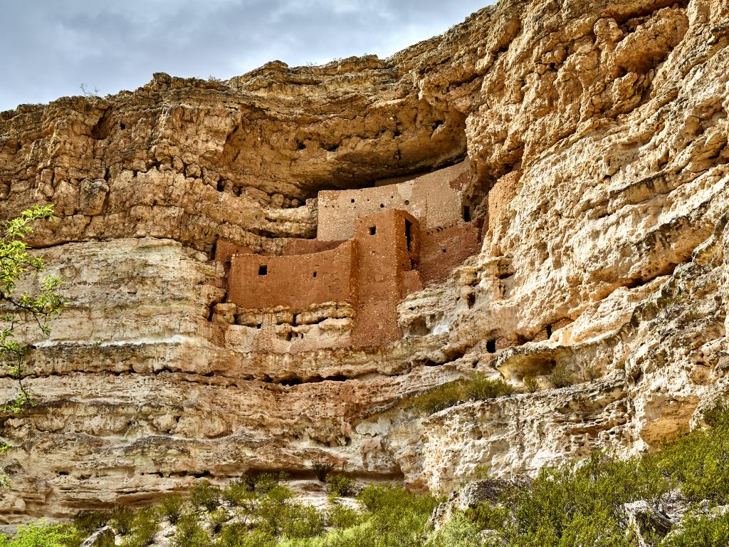 The Montezuma Castle National Monument carved into the mountains on the way from Sedona to Phoenix, Arizona.