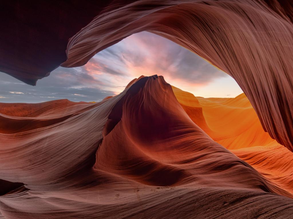 Antelope Canyon, Arizona, USA looking through the incredible rock curves to the sky in the distance.