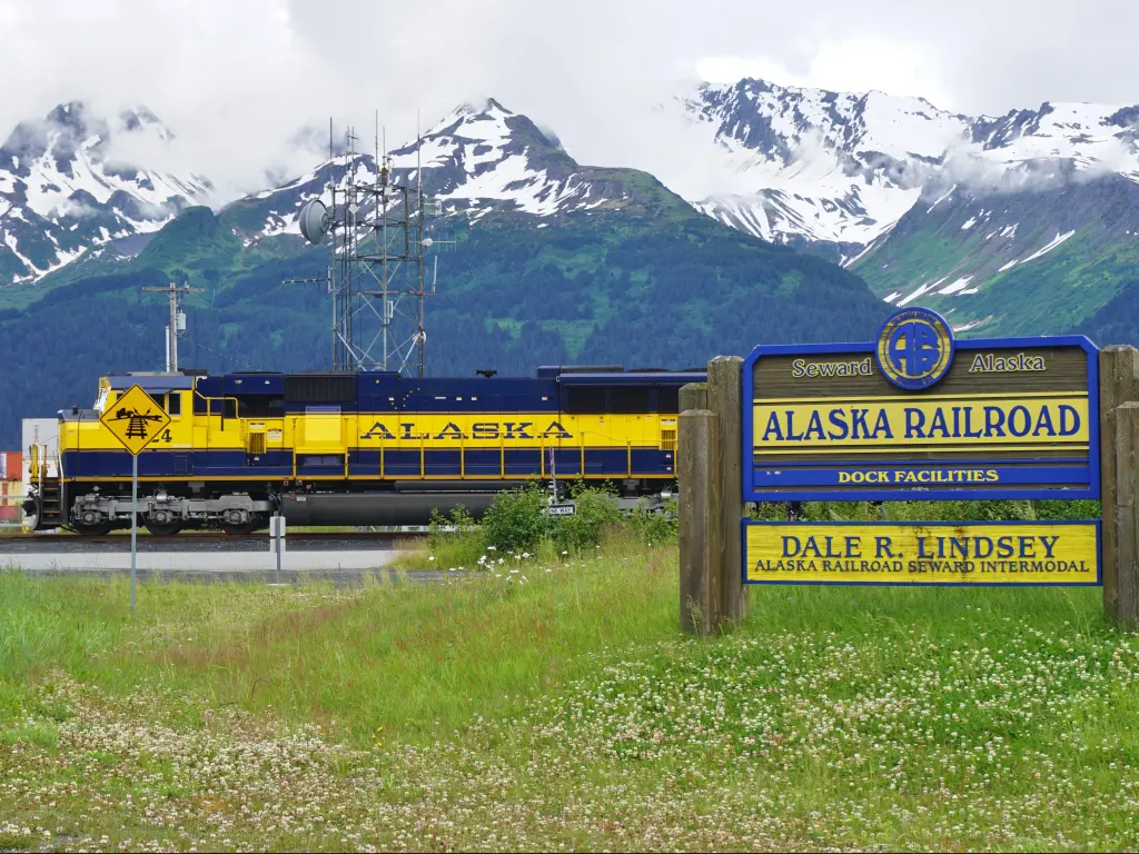 Blue and yellow cars of the Alaska Railroad, a vintage train going from Seward