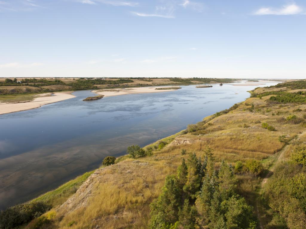 View across South Saskatchewan River and surrounding grasslands either side, Saskatchewan