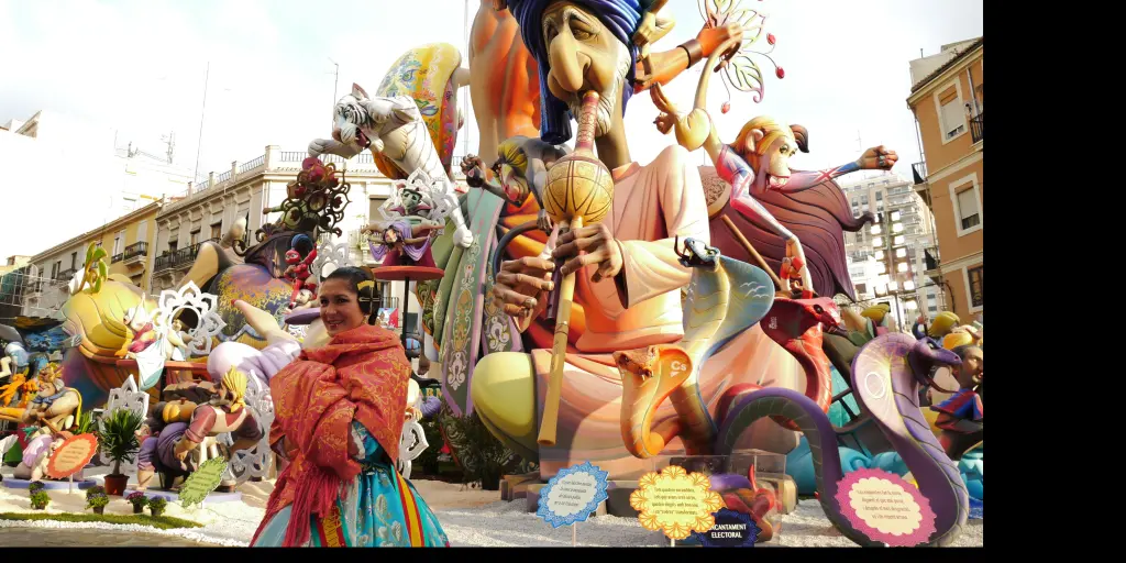 Ninot puppets moving down the street at the Las Fallas festival in Valencia