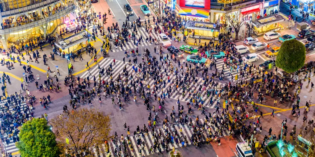 Crowds of people walking across the Shibuya Crossing, Tokyo 