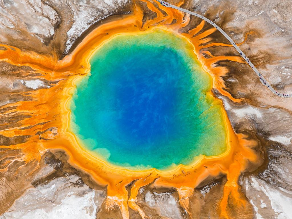 Grand Prismatic Spring, Midway Geyser Basin, Yellowstone National Park, Wyoming, USA. The colorful waters are caused by a bacteria.