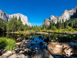 Yosemite National Park, Mountains and Valley view with clear waters surrounding rocks