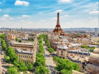 Beautiful panoramic view of Paris from the roof of the Triumphal Arch. Champs Elysees and the Eiffel Tower.