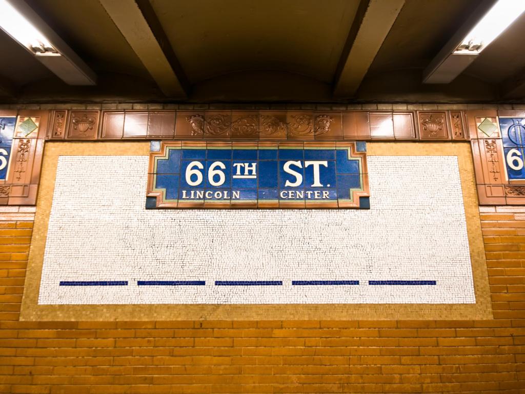 Vintage tile subway sign at platform at landmark NYC Lincoln Center stop