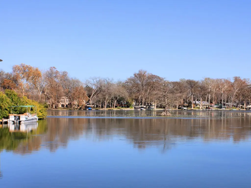 View across lake and boating docks of Lake McQueeney, Texas