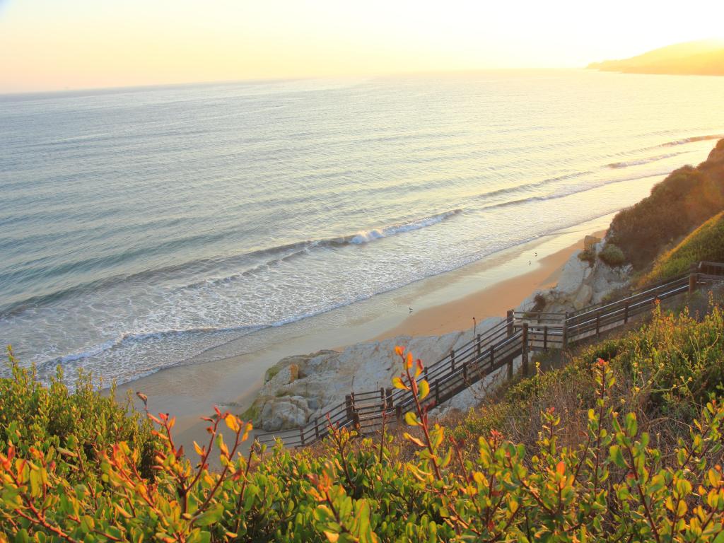 Santa Barbara, California, USA with a view of the Santa Barbara Channel, taken from El Capitan State Beach at sunset.