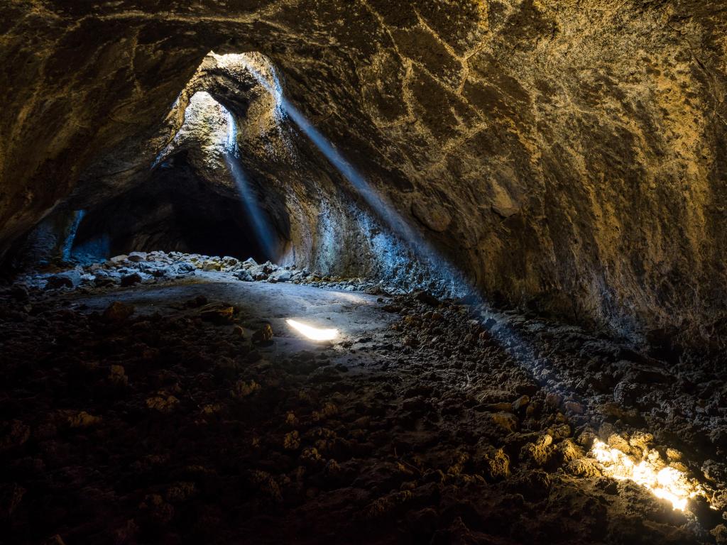 Oregon Caves, Oregon, USA a light shining through the caves.