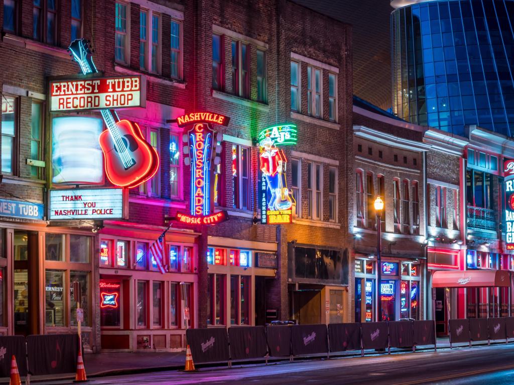 Nashville, Tennessee, USA with neon signs on Lower Broadway Area taken at night.