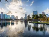 Sunset at Orlando in Lake Eola Park with water fountain and city skyline, Florida, USA