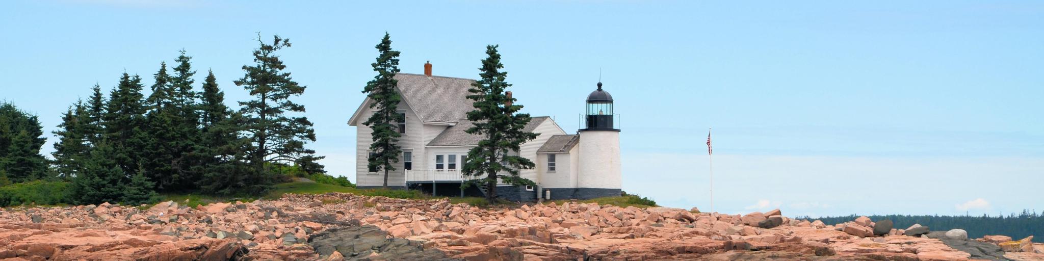 One of several lighthouses in Bar Harbor area of Maine on a mostly clear day