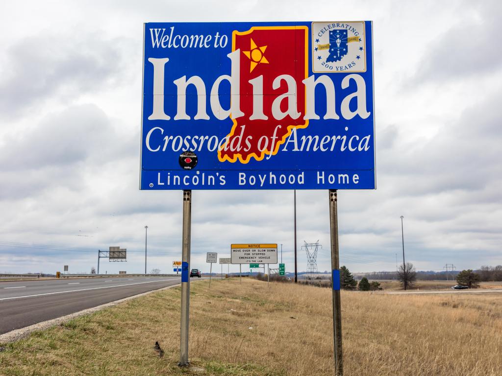 Welcome to the State of Indiana, road sign along Interstate 70 on a cloudy day