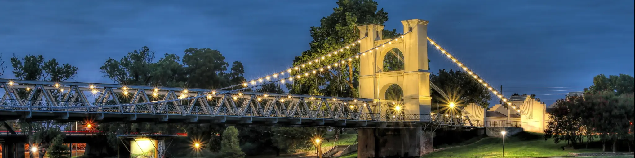 The historic Waco suspension bridge, built in 1870 and located in Indian spring park on the Brazos River.
