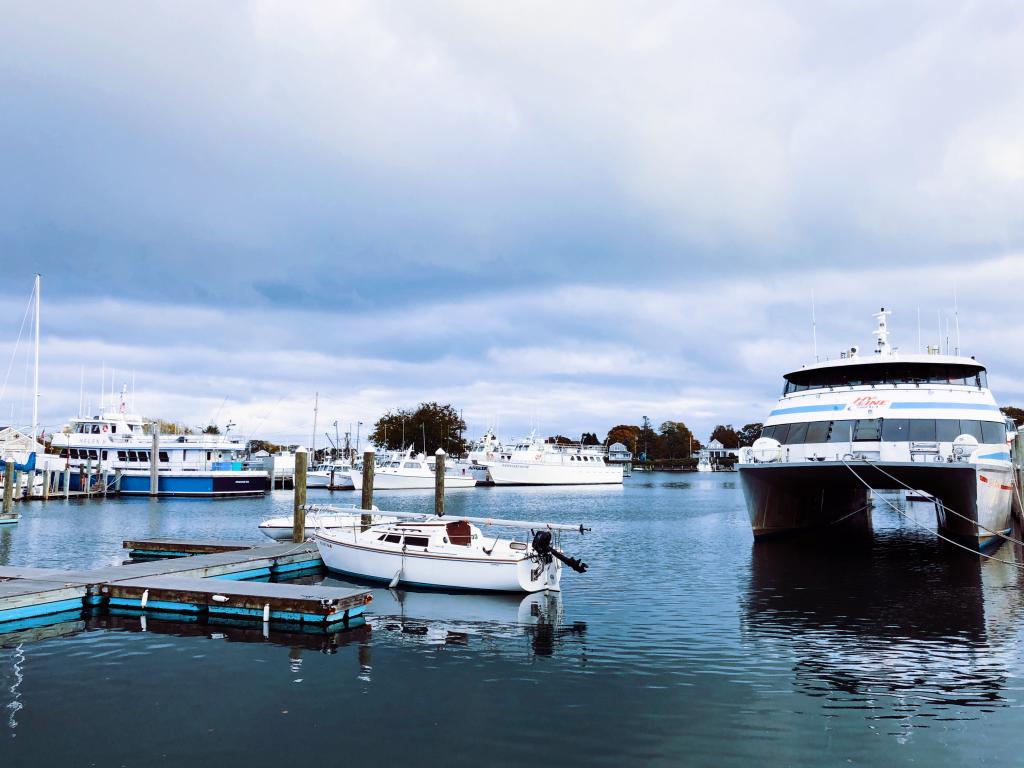 A harbor at Hyannis,Massachusetts with boats docked during daytime.