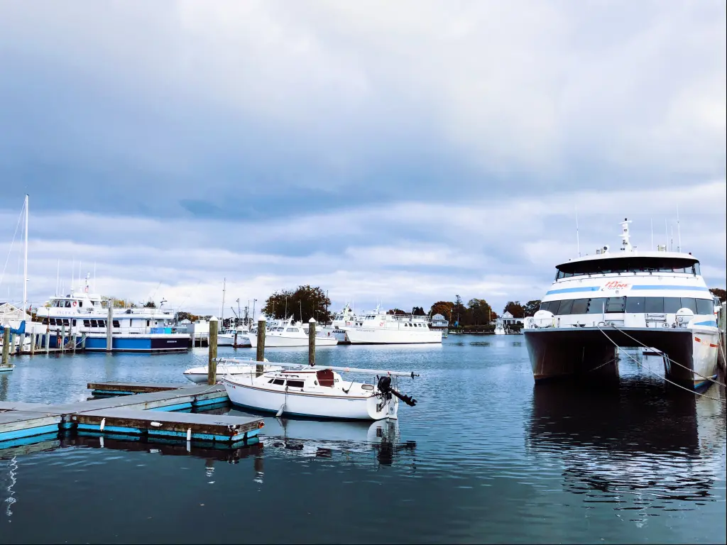 A harbor at Hyannis,Massachusetts with boats docked during daytime.