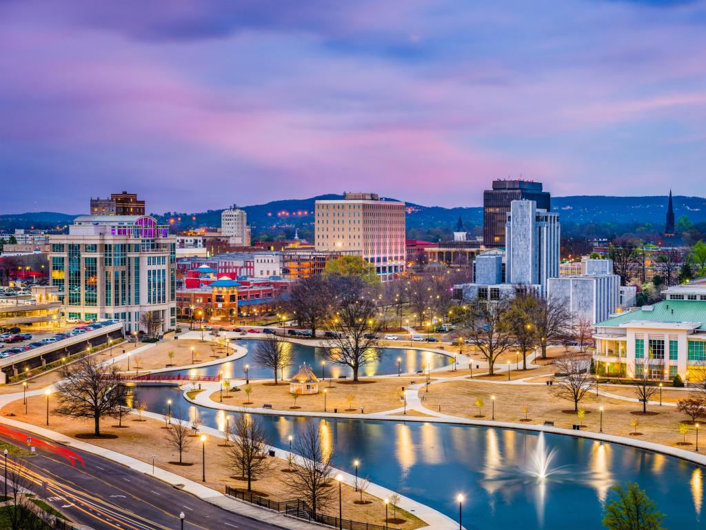 Huntsville, Alabama, USA park and downtown cityscape at twilight.