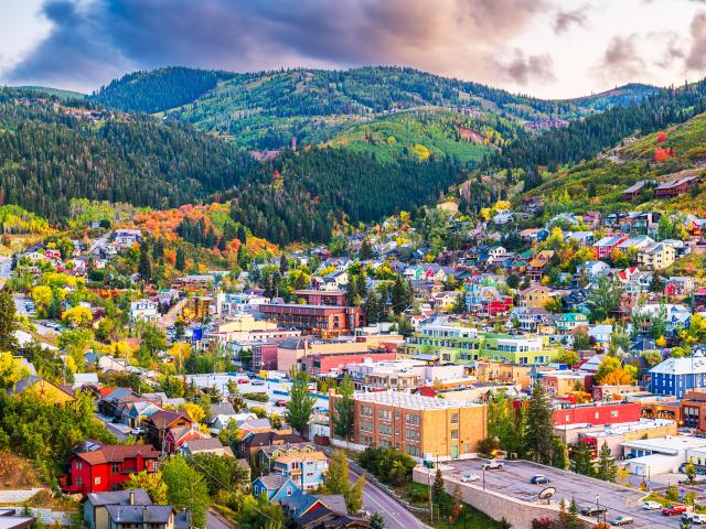 Autumn view of Park City nestled on the foothills of forested mountains