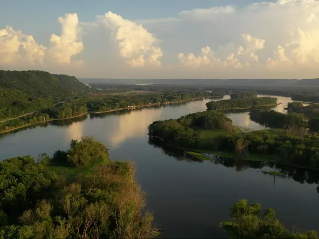 Mississippi River, Minnesota/Wisconsin, USA with an aerial scenic view of the river and bluffs at sunset. 