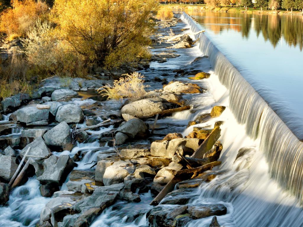 An autumn view of the water fall that the city of Idaho Falls