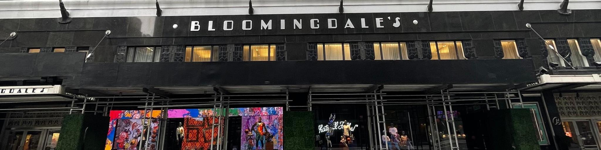 Front entrance to Bloomingdales Department Store in Upper East Side with flags lined up over the famous doorway