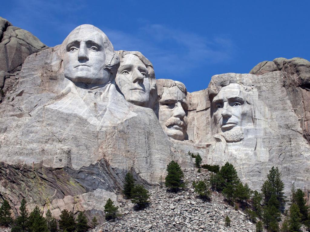 Mount Rushmore National Monument, South Dakota, USA with the presidents in the rock taken on a summer day with clear skies.