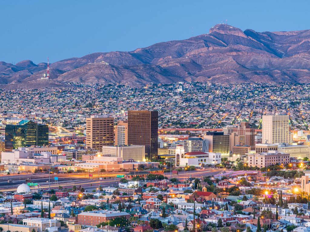 El Paso, Texas, USA downtown city skyline at dusk with Juarez, Mexico in the distance.