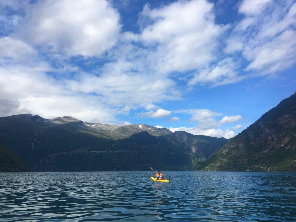 A kayaker on a sunny day in Norway