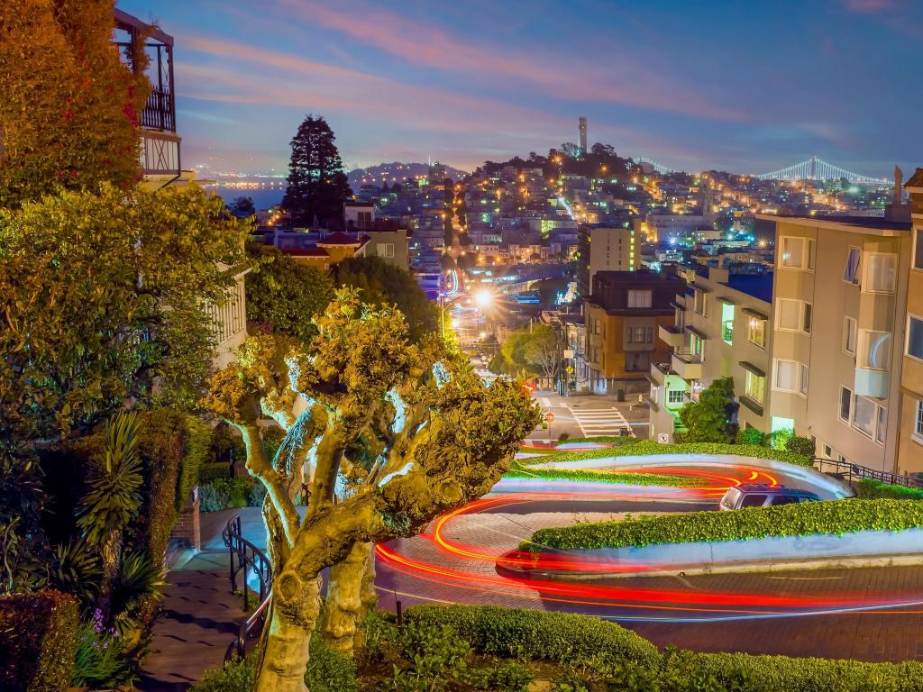 Famous Lombard street in downtown San Francisco cityscape in USA at night.
