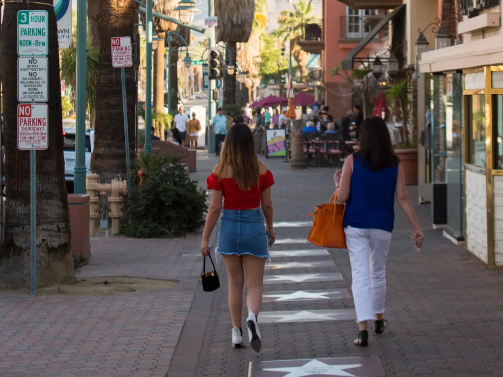 People walking along the shops of Palm Canyon Drive, Palm Springs